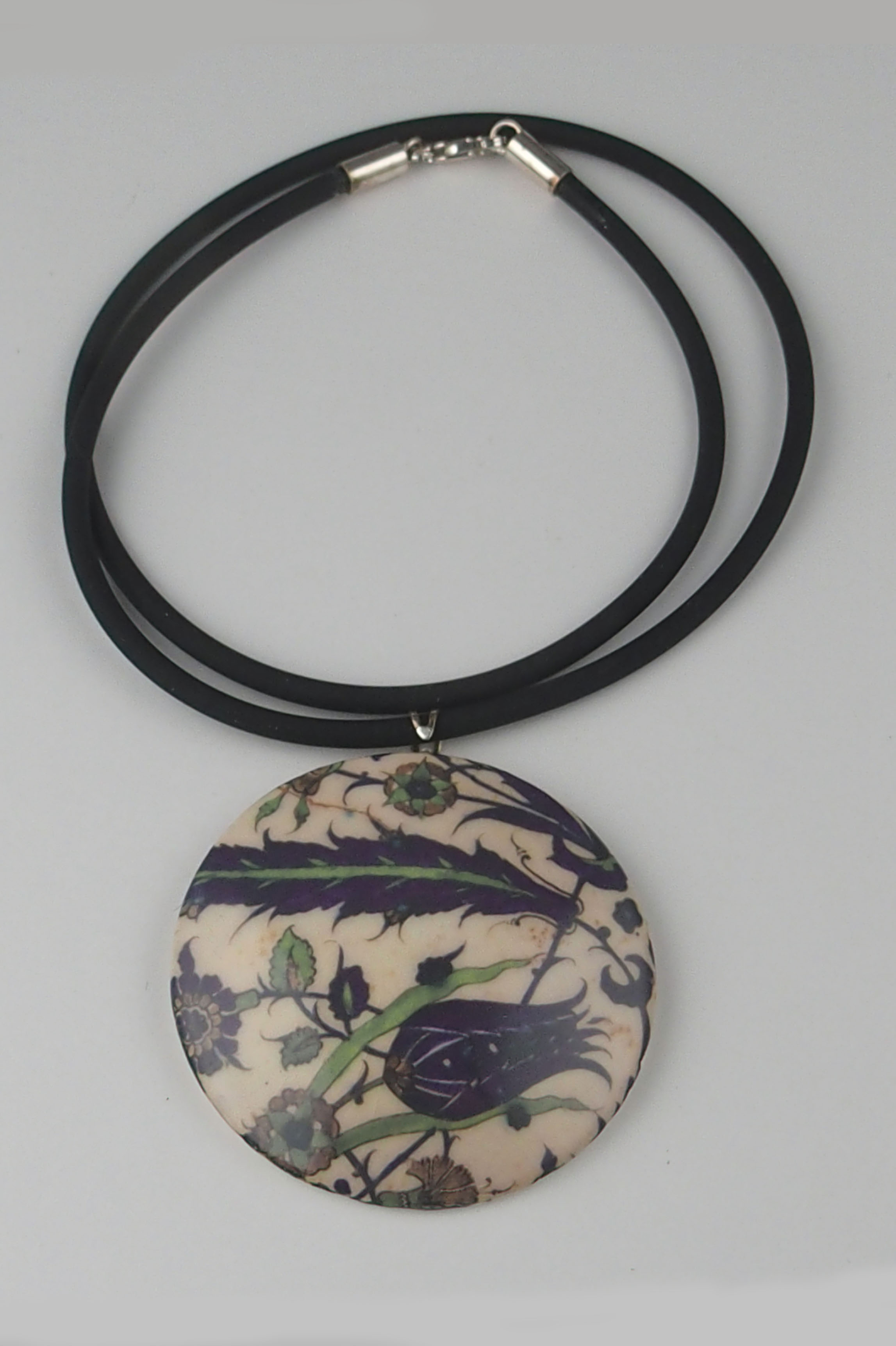 View Iznit Pottery pendant